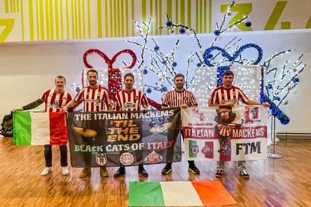 The Mackem-loving Italians with their banners.