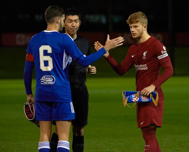 Luca Stephenson of Liverpool and Marko Soldo of GNK Dinamo Zagreb