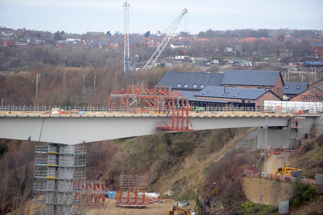 How workers battled through storms to hit latest milestone in ...