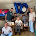 Freddie celebrating his 100th birthday with his great nieces and nephews.