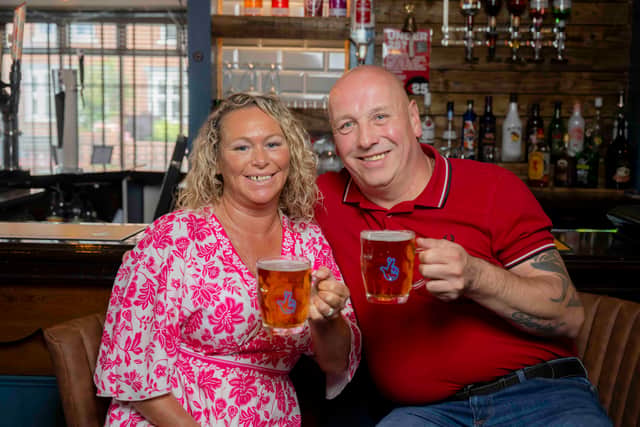 John and Lisa celebrate winning one million pounds on the national lottery .
