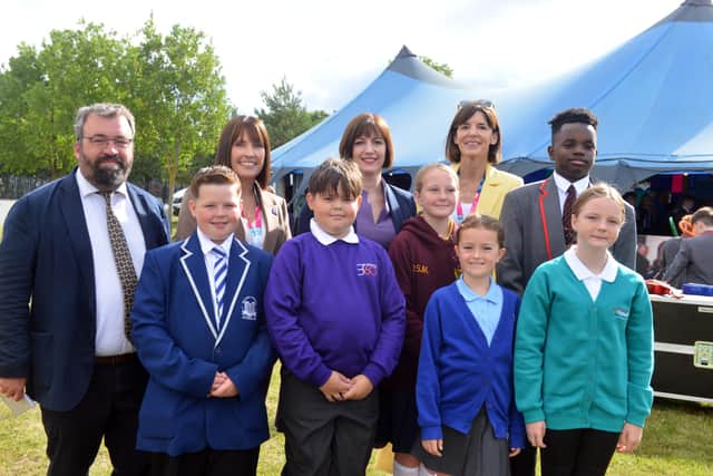 The secretary of state for education alongside Sally Newton, CEO of Laidlaw Schools Trust, and pupils from the six schools which will make up the fellowship.