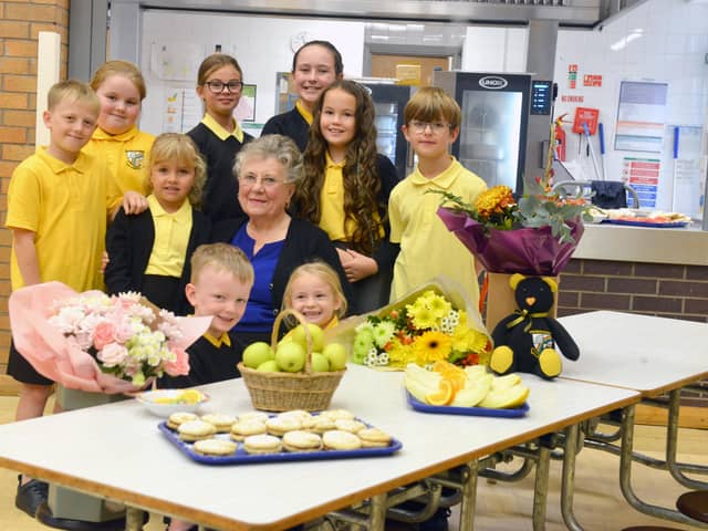 Lunchtime supervisor Maureen Lumsdon with some of the children at Fatfield Academy.