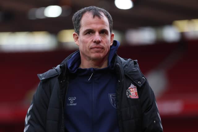 Regis Le Bris, Manager of Sunderland, inspects the pitch prior to the Premier League match between Nottingham Forest and Sunderland at City Ground on September 27, 2025 in Nottingham, England.