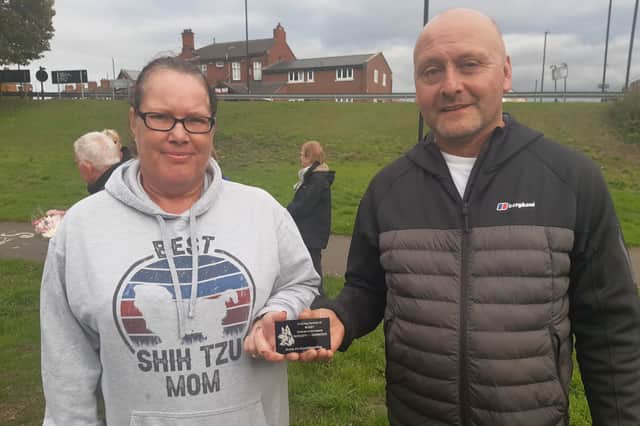 Jonathan Frost and Denise Welch with the plaque in memory of Buddy the Roundabout Dog.