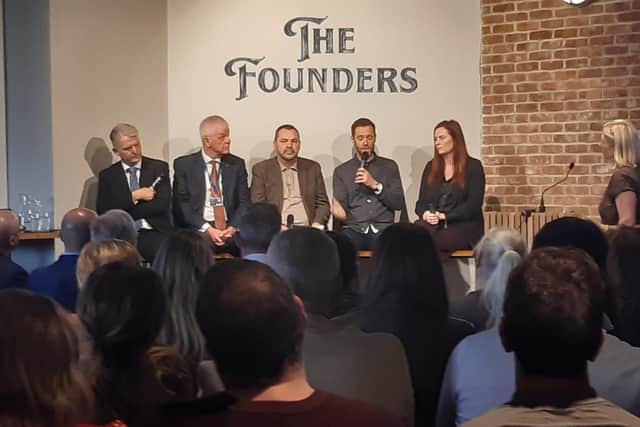 David Bruce and other panel members speaking at the Stadium of Light.