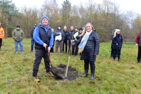 Veterans in Crisis Sunderland founder Ger Fowler and Cllr Lindsey Leonard plant a sapling from Sycamore Gap at Hetton Lyons Country Park during National Tree Planting Week.
