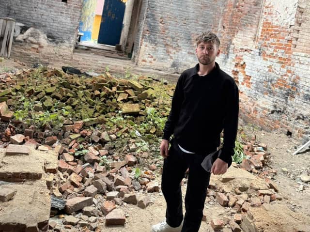 Corey in a war damaged church in Cherihiv in Ukraine. 