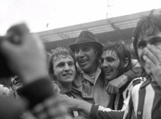 Bob Stokoe hugs his Sunderland players after the 1973 FA Cup triumph at Wembley, including Dennis Tueart and Ian Porterfield.