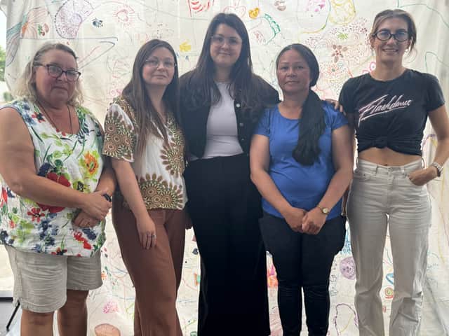 ICICOS … members at the Keel Square Pavilion exhibition, with The Cultural Spring’s Emma Biggins, right