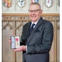 Brendan Tapping with his OBE.