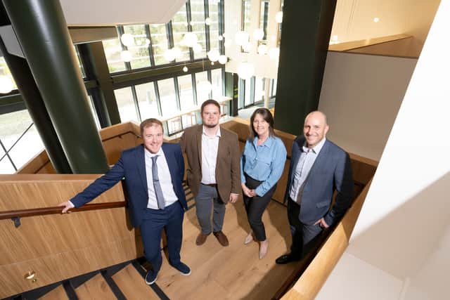 From left: Ben Kelsey, senior projects and performance manager at Durham County Council; Cllr Karen Allison, the council’s Cabinet member for leisure, tourism, regeneration and high street; Cllr Joe Quinn, Cabinet member for planning, investments and assets; and Ian Lamming, senior pre-construction manager at Willmott Dixon, pictured inside The Light.