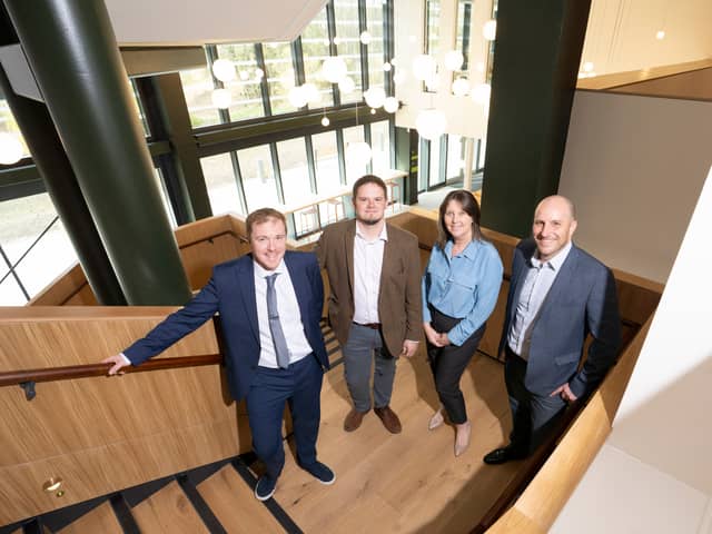 From left: Ben Kelsey, senior projects and performance manager at Durham County Council; Cllr Karen Allison, the council’s Cabinet member for leisure, tourism, regeneration and high street; Cllr Joe Quinn, Cabinet member for planning, investments and assets; and Ian Lamming, senior pre-construction manager at Willmott Dixon, pictured inside The Light.