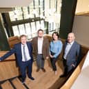 From left: Ben Kelsey, senior projects and performance manager at Durham County Council; Cllr Karen Allison, the council’s Cabinet member for leisure, tourism, regeneration and high street; Cllr Joe Quinn, Cabinet member for planning, investments and assets; and Ian Lamming, senior pre-construction manager at Willmott Dixon, pictured inside The Light.