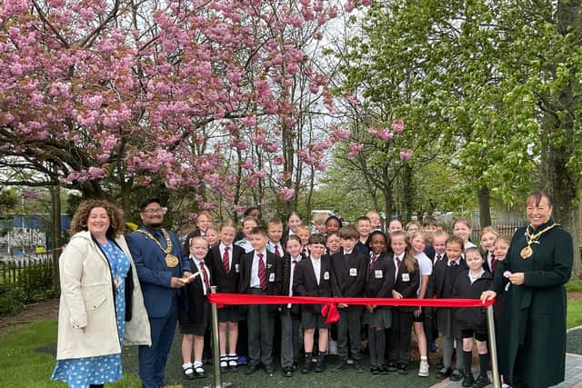 Northern Saints CofE Academy headteacher Rachel Heaney is joined by Sunderland Mayor, Cllr Ehthesham Haque, and Mayoress Cllr Lynda Scanlan to open the new playground.