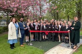 Northern Saints CofE Academy headteacher Rachel Heaney is joined by Sunderland Mayor, Cllr Ehthesham Haque, and Mayoress Cllr Lynda Scanlan to open the new playground.