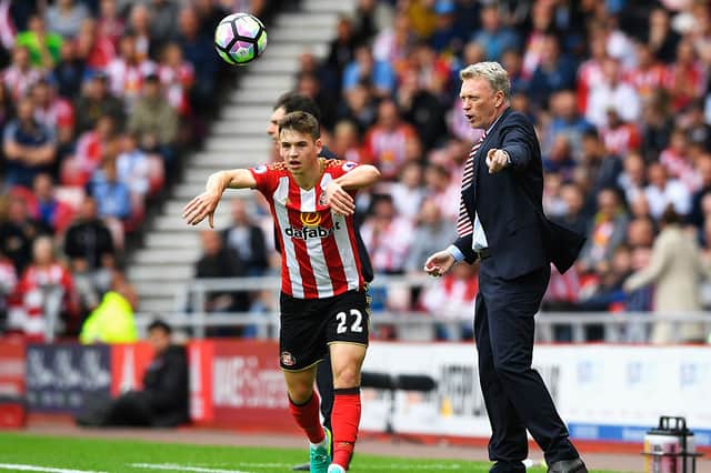 David Moyes, then manager of Sunderland gives instructions as Donald Love of Sunderland takes a throw in during the Premier League match between Sunderland and Middlesbrough at Stadium of Light on August 21, 2016.
