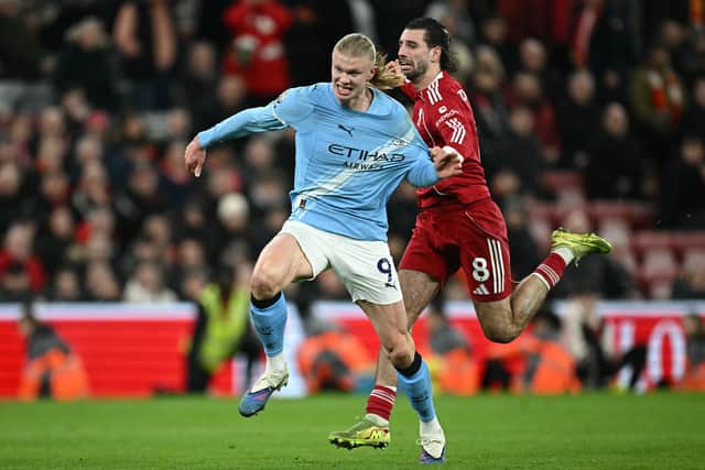 Liverpool midfielder Dominik Szoboszlai and Manchester City striker Erling Haaland.