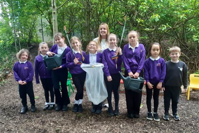 Year 4 teacher Courtney McCluskey with the school's Eco Committee.