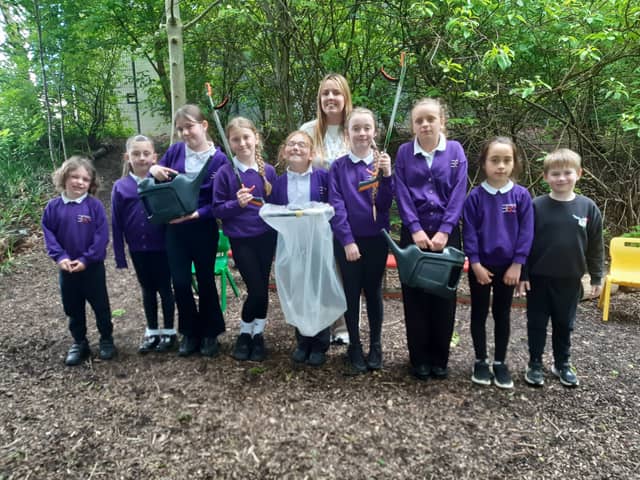 Year 4 teacher Courtney McCluskey with the school's Eco Committee.