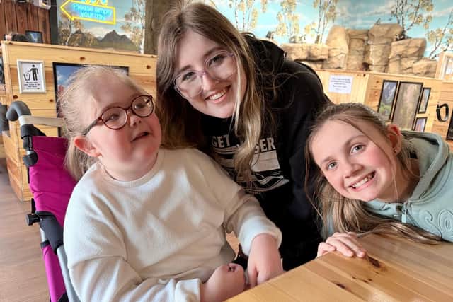 Seren with her loving sisters - Chanelle 17 and Summer 11 - who help mum Sha'ani by providing fantastic support.