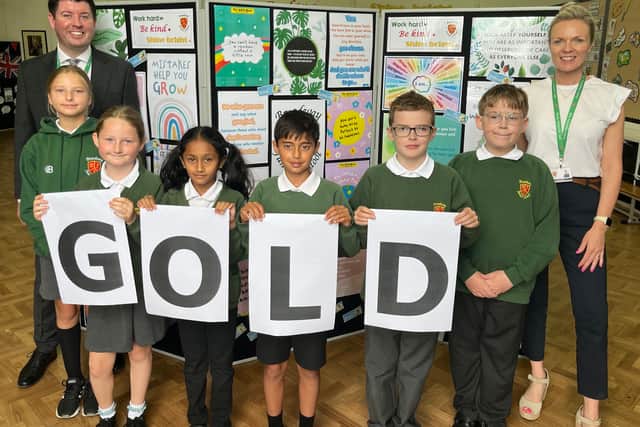 Staff and pupils at Broadway Junior School are celebrating their award