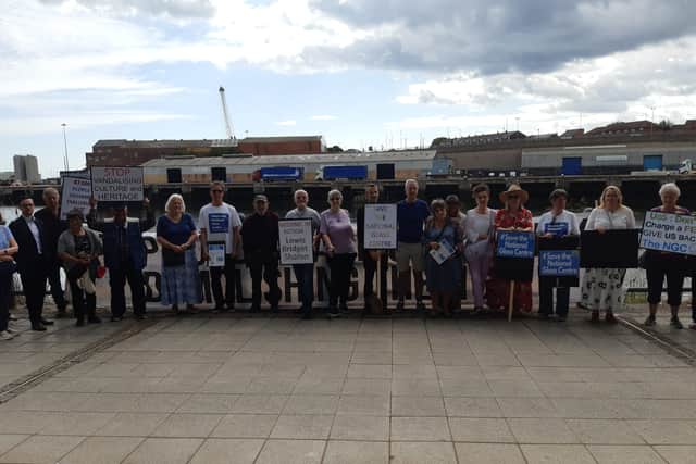 Campaigners gather outside of the National Glass Centre as it closed its doors to the public for the last time.