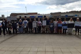 Campaigners gather outside of the National Glass Centre as it closed its doors to the public for the last time.