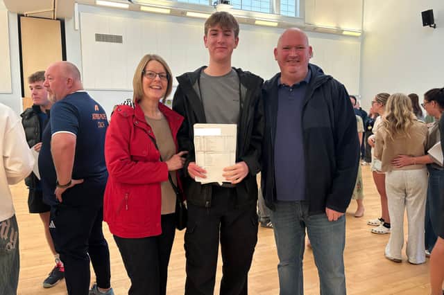 Matthew Scullion with his parents Barbara and Andrew on GCSE results day at Whitburn Academy.