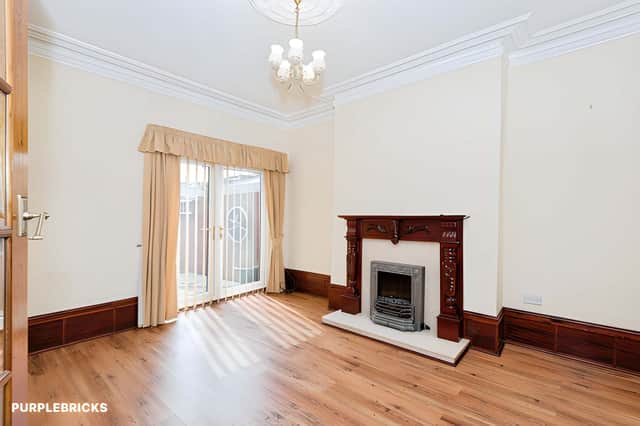 High ceilings add a sense of space and light to the reception accommodation, with two separate rooms offering flexibility