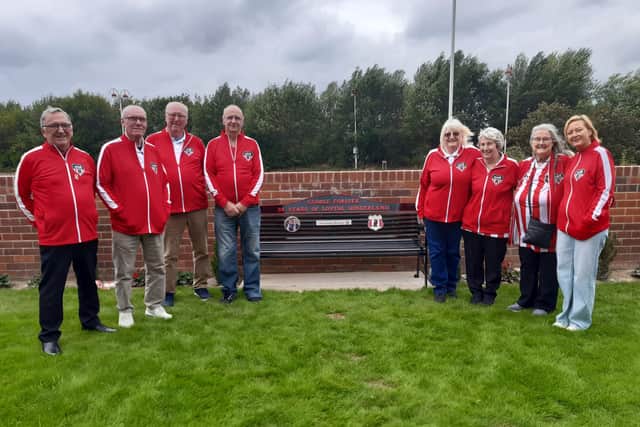 Joanne Youngson (far right) and members of the SAFC Heaven Branch at the new memorial garden.