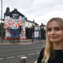 Artist Kathryn Robertson in front of her mural celebrating Sunderland AFC playing in Europe.
