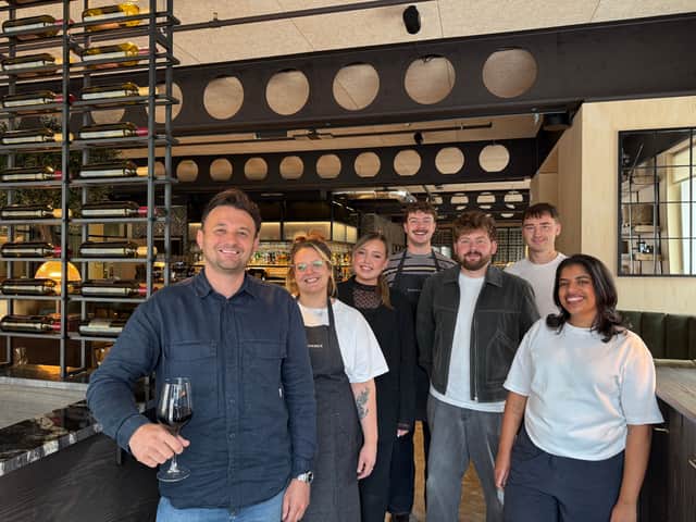 Blacks Corner co-owner Jonny Dryden, left, with Blacks Corner team members Lauren Gracie, Brooke Swinney, Joseph Smith, General Manager Thomas West, and Joe Miller.