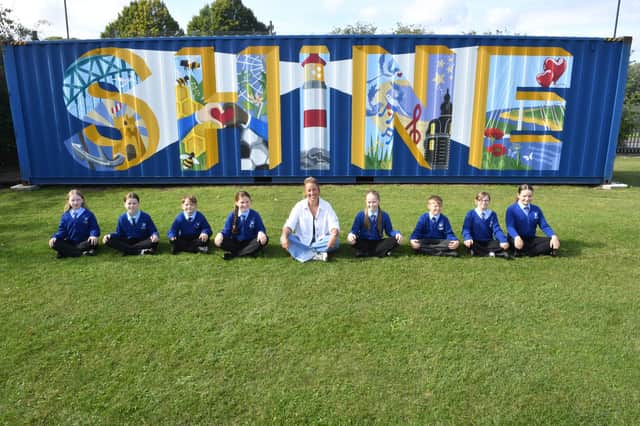 The children came up with the ideas of what to include in the mural, with artist Gemma Lynas bring them all together to create the final design.