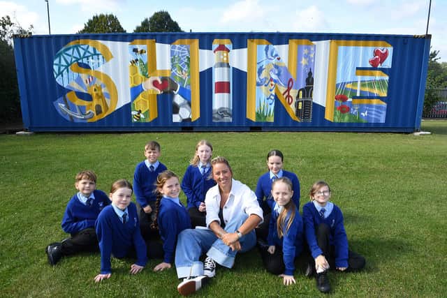Artist Gemma Lynas with Castletown Primary pupils Olivia, Alice, Tommy, Sienna, Everley, Oliver, Luna and Holly.
