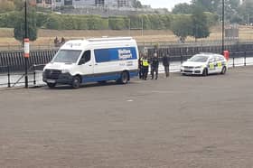 Police officers remained at the scene this morning.