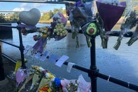 Tributes and messages of support left at the scene of the tragedy.