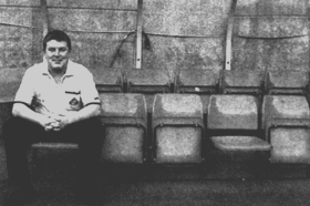 Colin Lynch in the dugout after winning a competition to become a 'Sunderland player'.