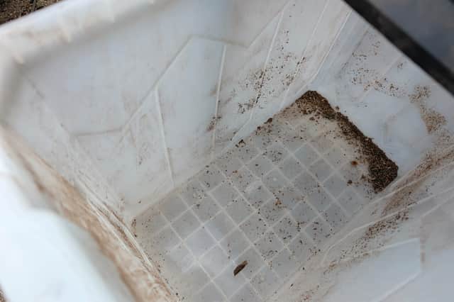 The 60 litre container can be slid out and taken to the tip