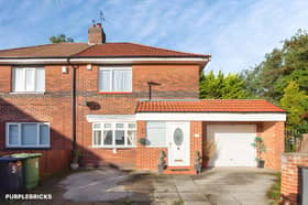 The extended semi-detached house sits at the head of a quiet cul-de-sac and benefits from a driveway and garage