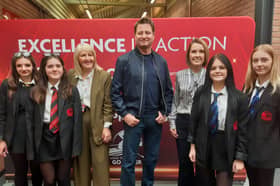 George Clarke with head teacher Amanda Parkes, Laidlaw Schools Trust CEO Sally Newton, and pupils Ava Bell, Sofia Lazazera, Lola Campbell, and Kaydee Okon.