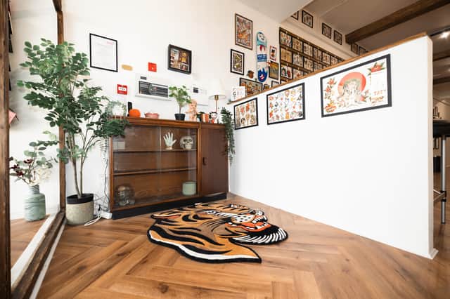 Inside the new tattoo studio in a former dance studio