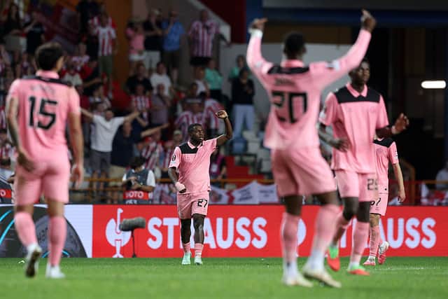 Sunderland players and fans celebrate after late Europa League drama.