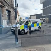 Police vehicles and a police cordon outside of the Wheatsheaf pub in Monkwearmouth.