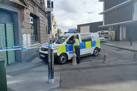 Police vehicles and a police cordon outside of the Wheatsheaf pub in Monkwearmouth.