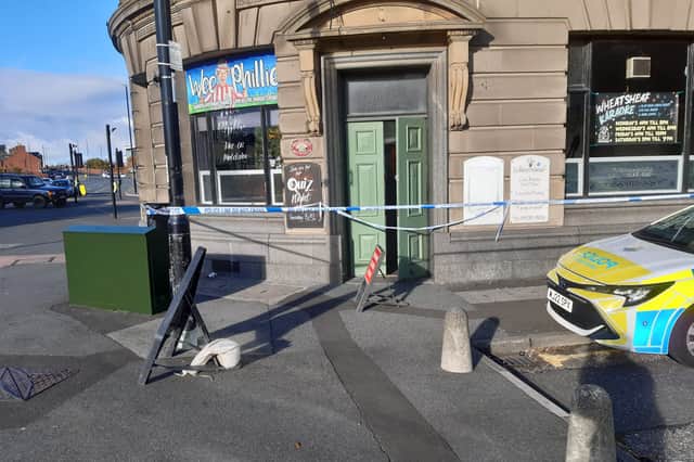 Police officers were seen going in and out of the Wheatsheaf pub.
