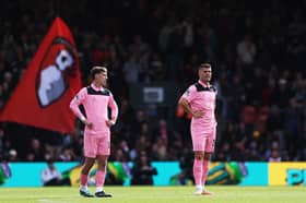 Granit Xhaka and Chris Rigg of Sunderland react after Bournemouth's first goal.