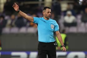 Referee Balazs Berke gestures during the UEFA Europa League between Fiorentina LASK in December 2024.