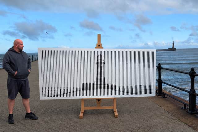 Sunderland artist Darren Timby with his clever piece of art