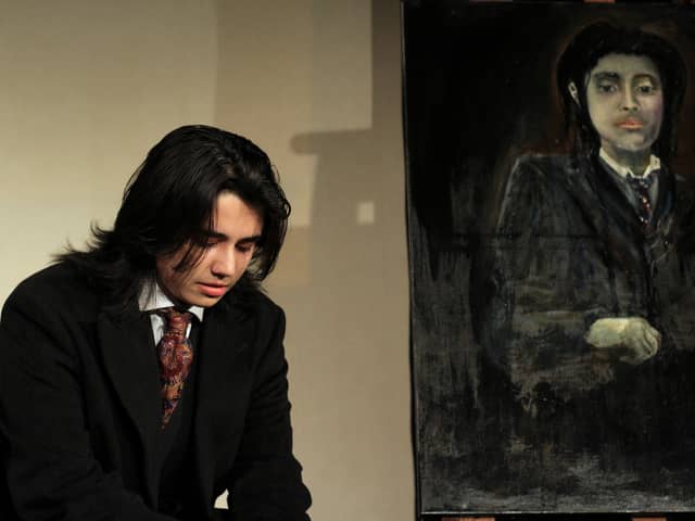 Kurt Cadwallender as Dorian Gray in rehearsal.